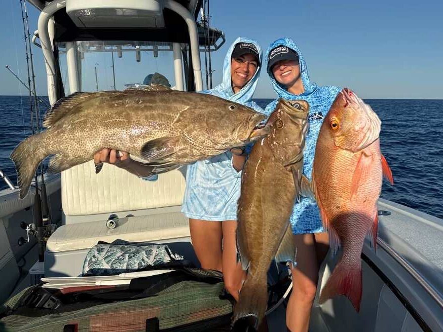 two happy customers on epic fishing trip in Key West Florida