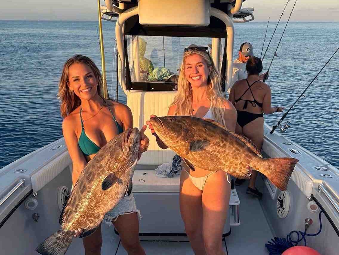 big pine key fishing charter nicole steffens e1749226690545 Reel Guides Nicole Steffens and Shauna Barton proudly showing off their catches at sunset during an unforgettable outing with Big Pine Key fishing charters.